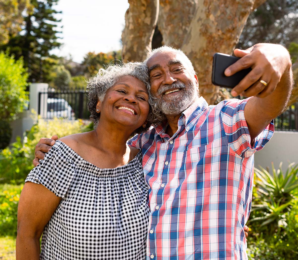 Couple Smiling Looking Outdoors